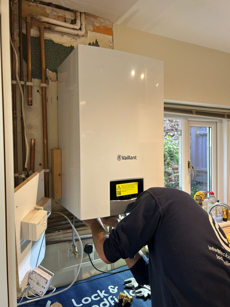 L&L Engineer working on Vaillant boiler